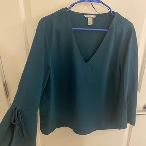 Gently worn teal blouse from H&M. Size 10.